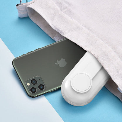 "3-in-1 matkailijan puhelinlaturi, kompakti ja kevyt, musta, punainen ja valkoinen, matkustamiseen ja nopeaan lataukseen."