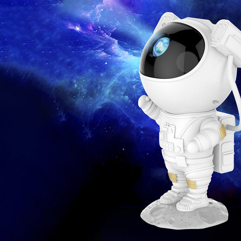 Astronautin muotoinen LED-yövalo tähtiprojektorilla aikuisille, säädettävä kirkkaus ja pyörivä tähtitaivas.