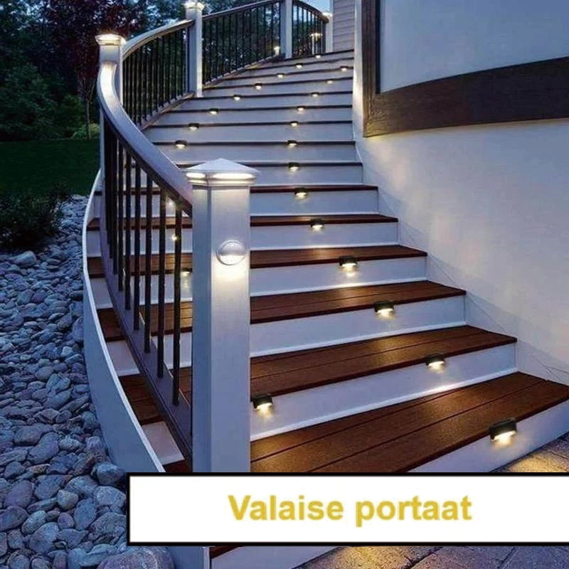 "Aurinkovoimainen musta terassivalo, lämmintä sävyä, vesitiivis, moderni muotoilu ulkokäyttöön."