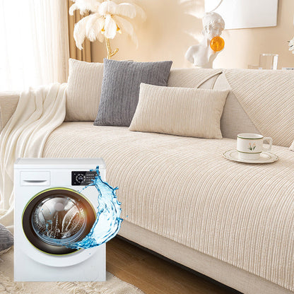 Chenille-kankainen sohvanpäällinen, harmaa, pehmeä pinta, suojaa sohvaa tahroilta ja lemmikkien jäljiltä, helppohoitoinen.