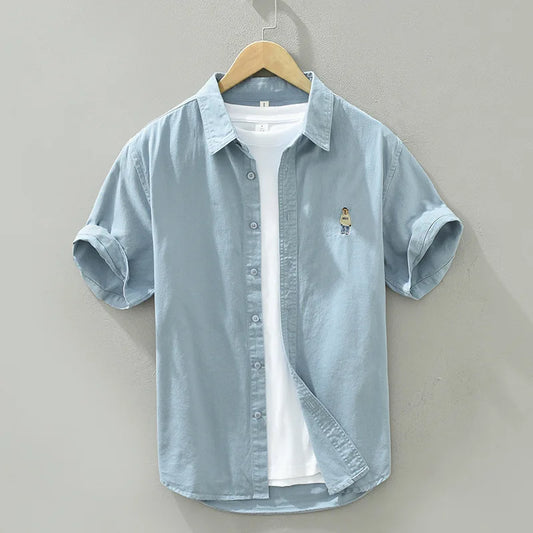 Miesten rento lyhythihainen puuvillapaita sarjakuvakuviolla, sininen paita; kesäinen, mukava ja tyylikäs.