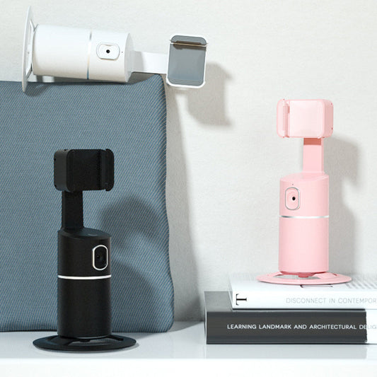 "Älykäs Selfie-ohjain 360°: Musta laite valkoisella taustalla, jossa pyörivä kamera ja kiinnitysjalusta."